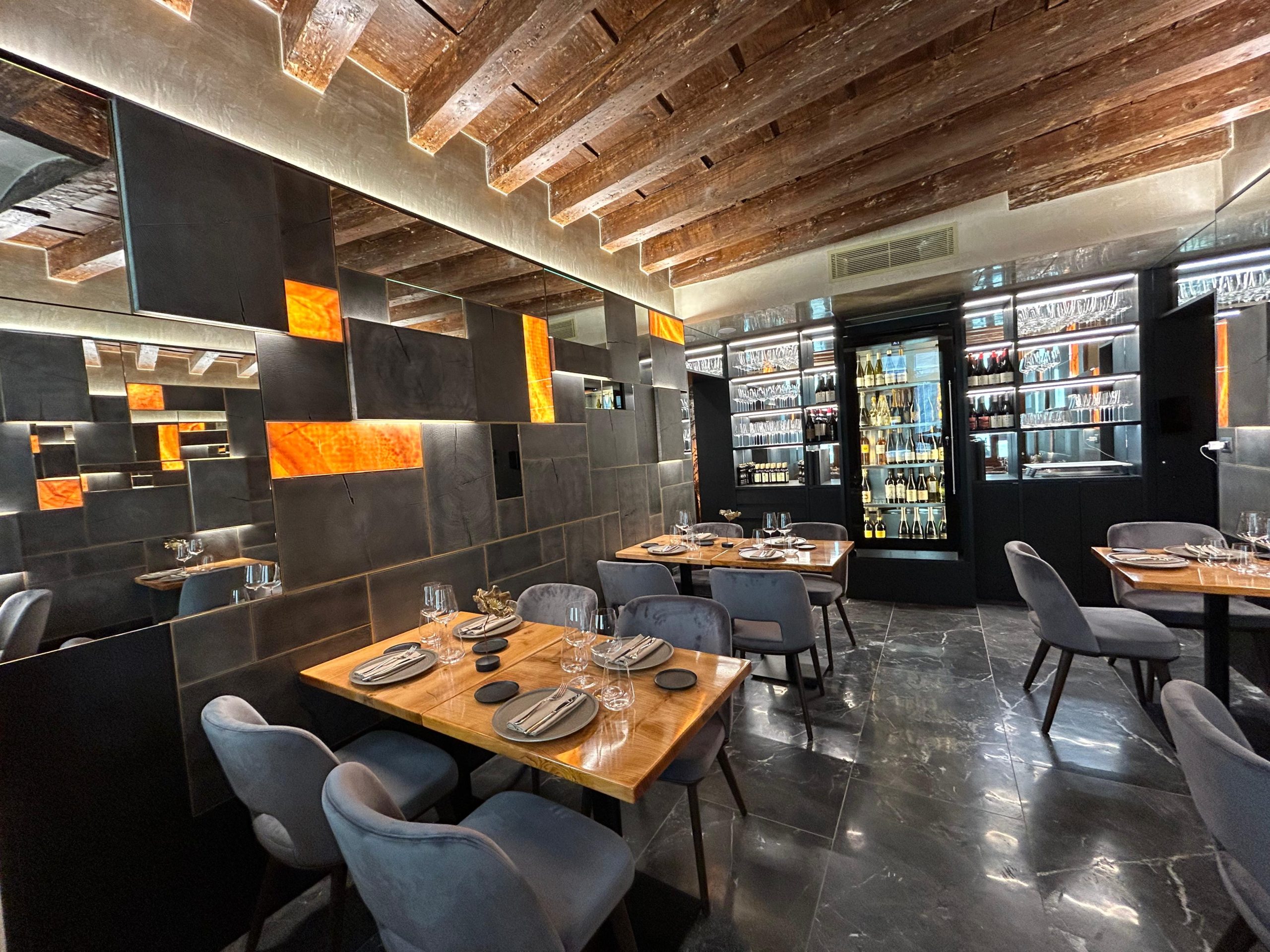 La Piazza Zone, San Marco 215 — dining room with marble and amber accents